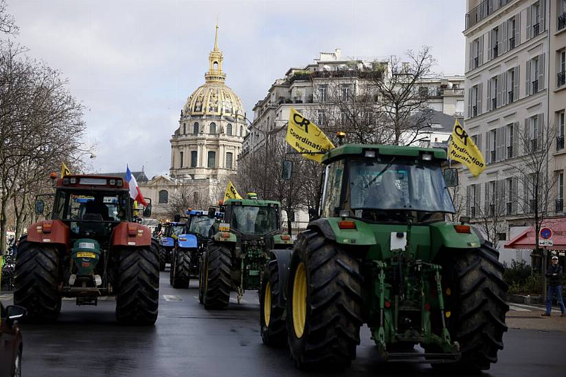 French Farmers Take Tractors Back On The Streets Of Paris In New Protest