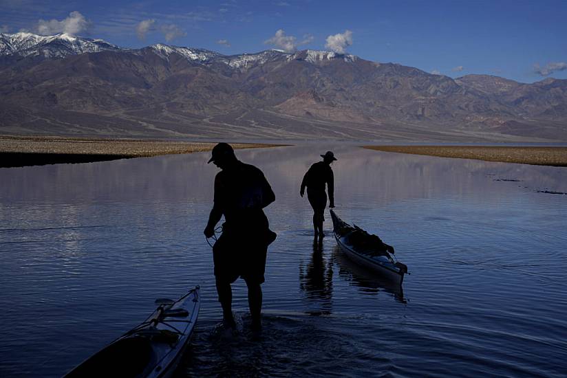 Kayakers Paddle In One Of Earth’s Driest Spots After Rains Replenish Lake