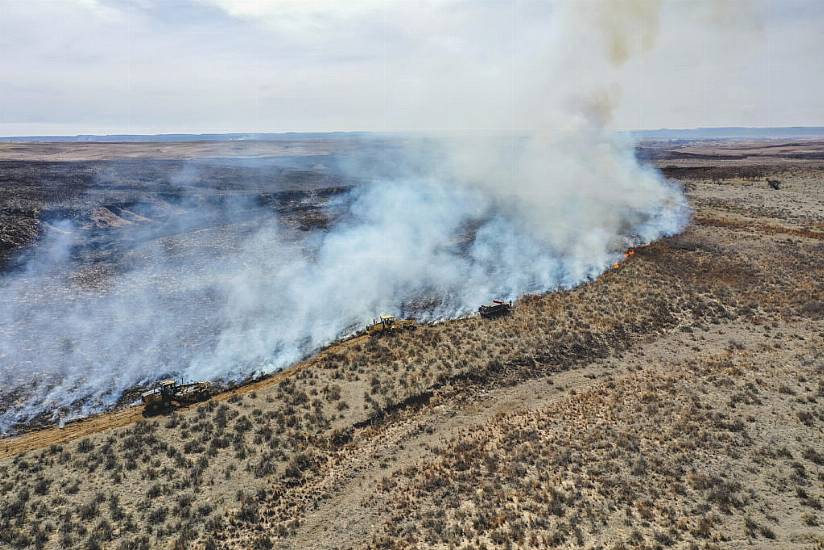 Firefighters Face Difficult Weather Conditions Amid Texas Wildfire Battle