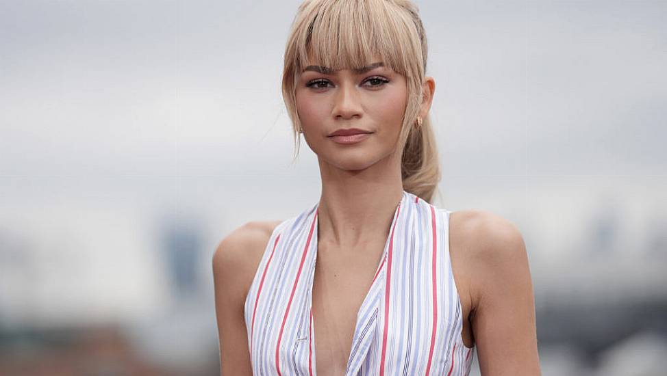 Zendaya Wears Striped Outfit With Fluffy Tail For Challengers Promotion