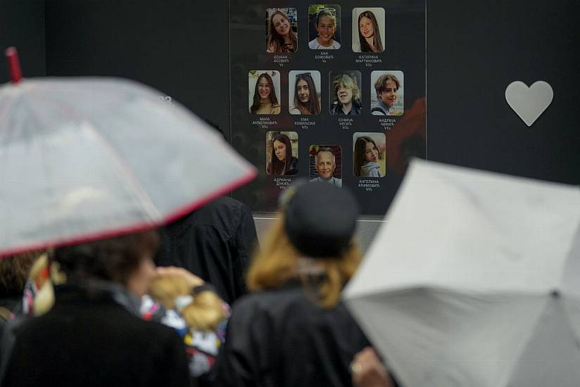 Flowers, Candles And Silence As Serbia Marks Anniversary Of School Shooting