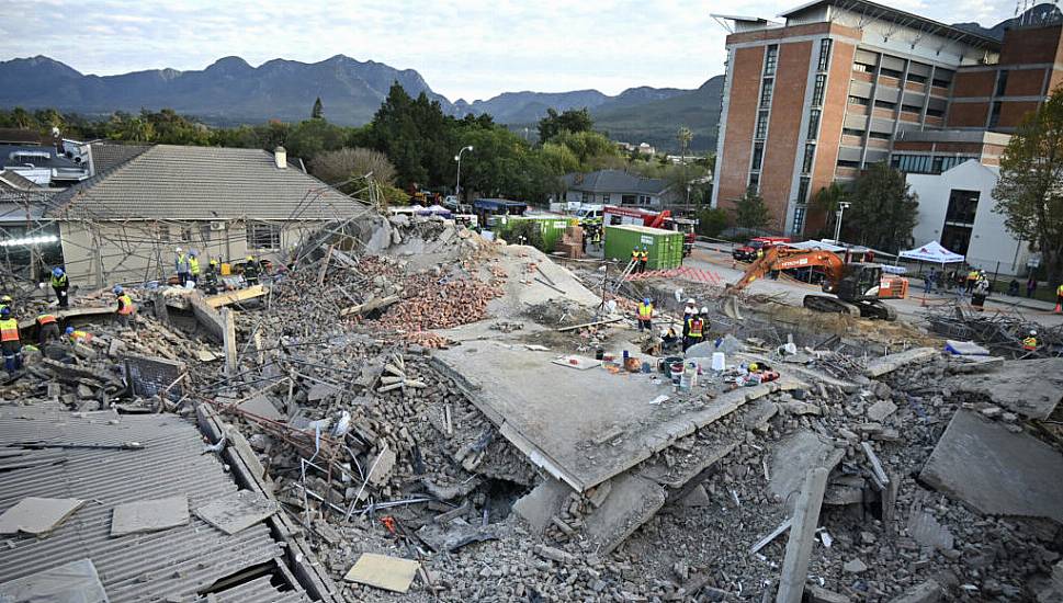 Rescuers Bring Survivors From The Rubble After Building Collapse In South Africa