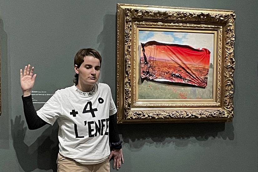 Climate Activist Sticks Protest Poster On Monet’s Poppy Field In Paris Museum