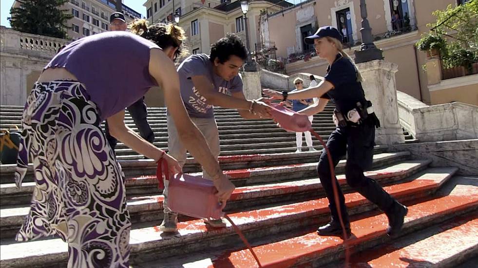 Activists Pour Paint Down Rome’s Spanish Steps In Outrage Over Femicide In Italy