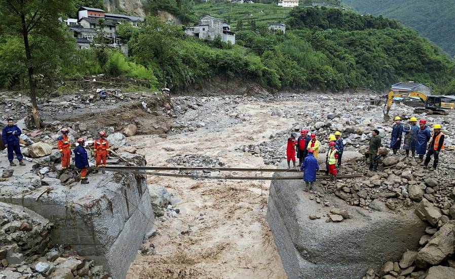 Search For Missing After Flooding And Bridge Collapse In China Kill At Least 25