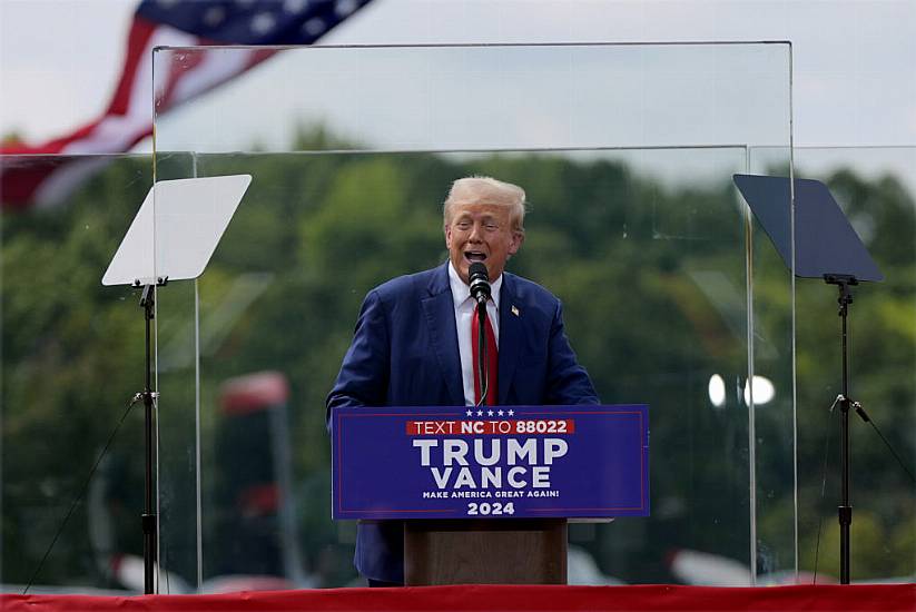 Trump Appears Behind Bulletproof Glass At First Outdoor Rally Since Shooting