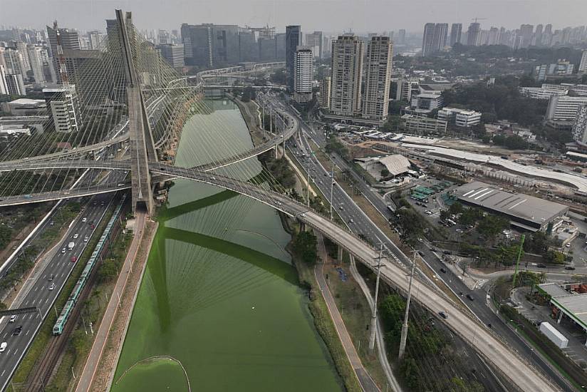 Sao Paulo River Turns Emerald Green As Drought Continues