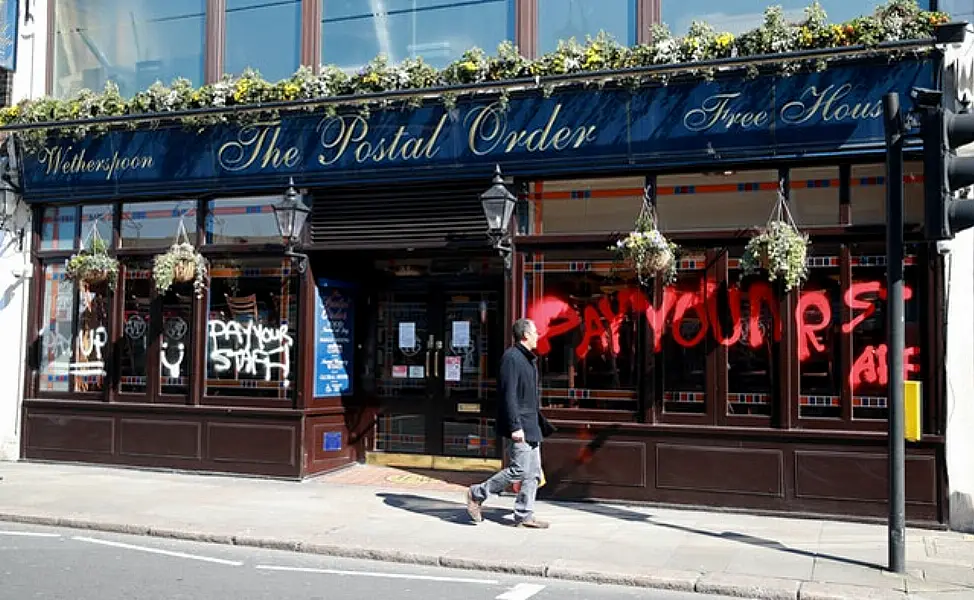 Wetherspoon pubs faced a difficult lockdown following reports that the company was considering withholding wages (Adam Davy/PA)