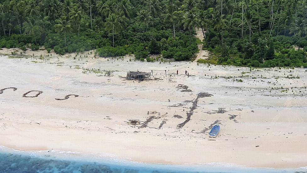 Men Rescued From Uninhabited Pacific Island After Writing Sos In Sand