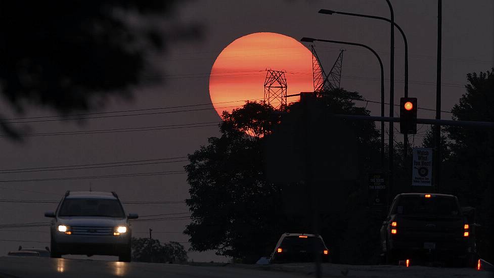 Stunning Sunsets And Hazy Skies Seen Thousands Of Miles Away From Us Wildfires