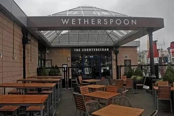 UK's Wetherspoon To Slip Into The Red Amid 'Laborious' Pub Recovery