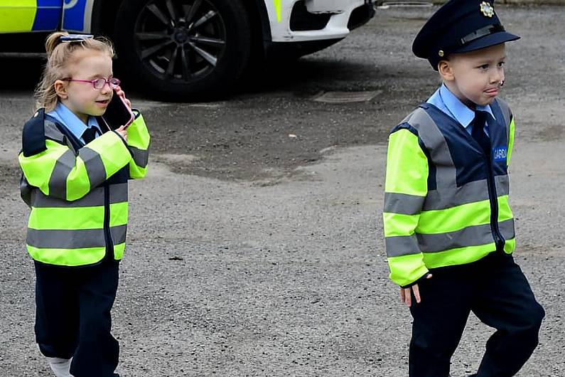 Two local children made honorary Garda&iacute; in an event that was 'the first of its kind'